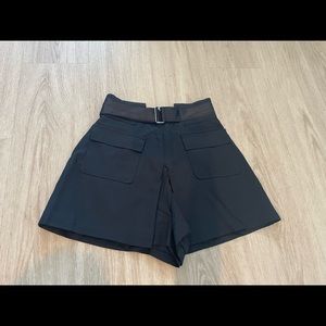 Black shorts with zipper in back and adjustable belt